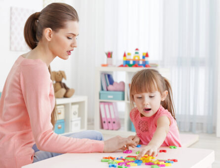 aba-higher-learing-girl-with-teacher